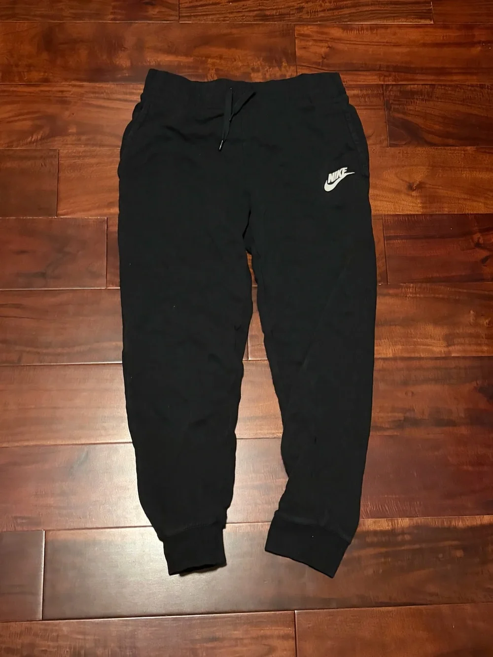 Nike Black Kids Sweatpants with White Swoosh
